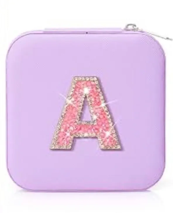 A lilac jewelry box with a rhinestone letter A on the lid.